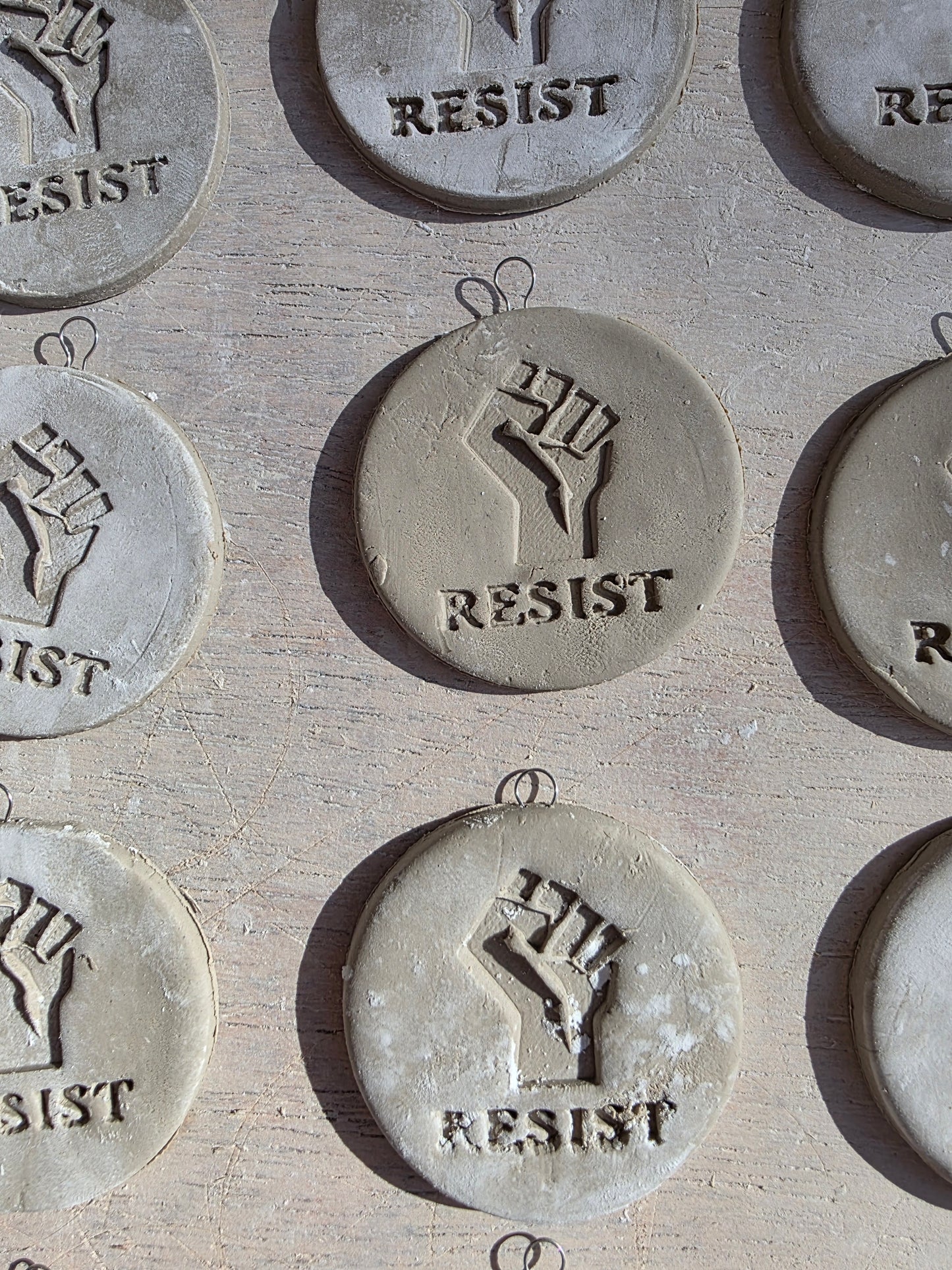RESIST Ceramic Medallions/Pendants